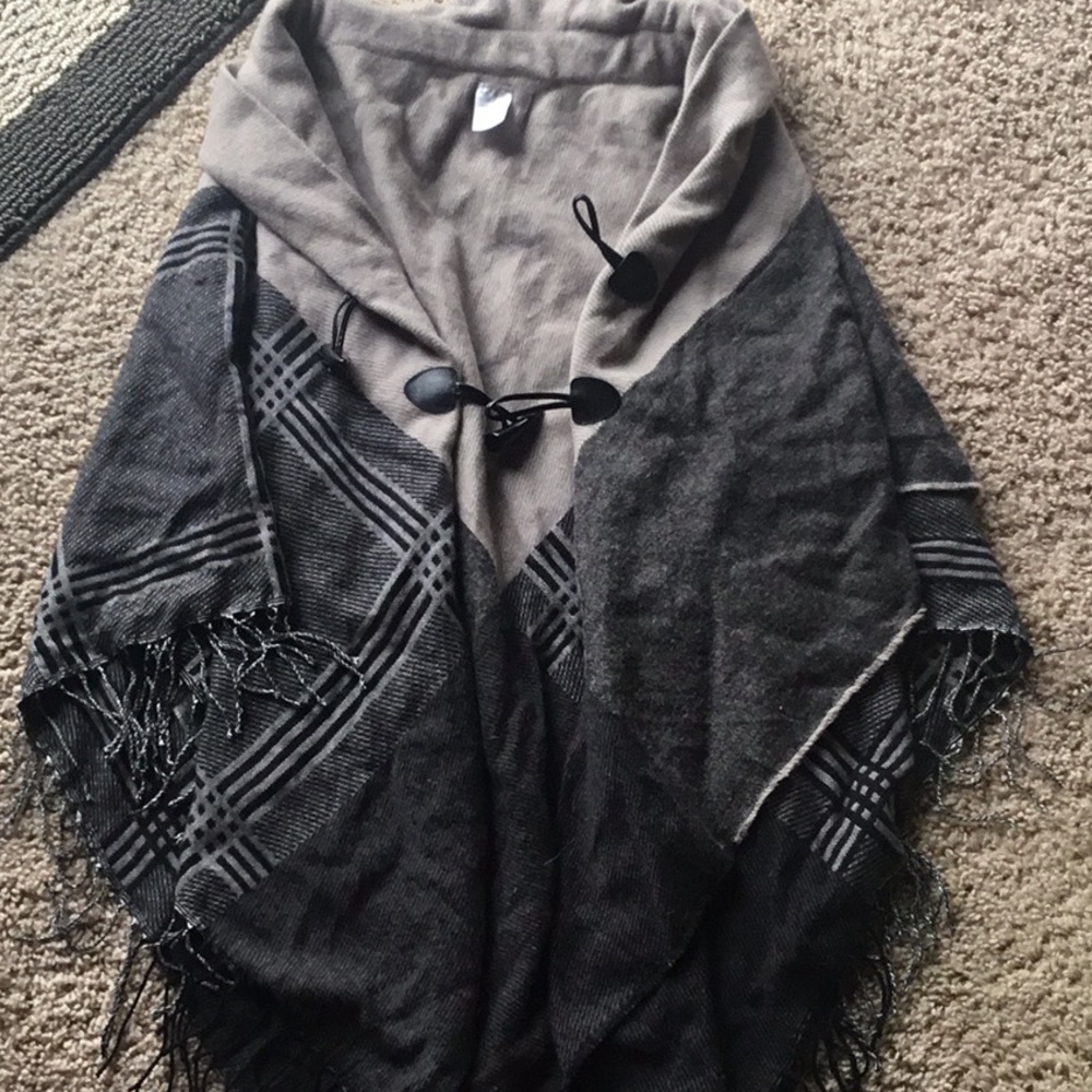 Poncho, never worn, unknown brand